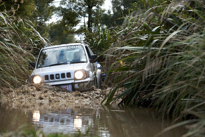 Navigate through muddy trails and dense bush in a 4X4 adventure tackling steep climbs and tight bends for an unforgettable journey in Rotorua’s wild terrain.